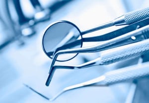 dentist's instruments with shallow depth of field blue tinted
