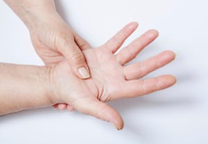 Elderly woman suffers from muscular pains