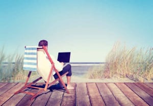 Businessman Working by the Beach
